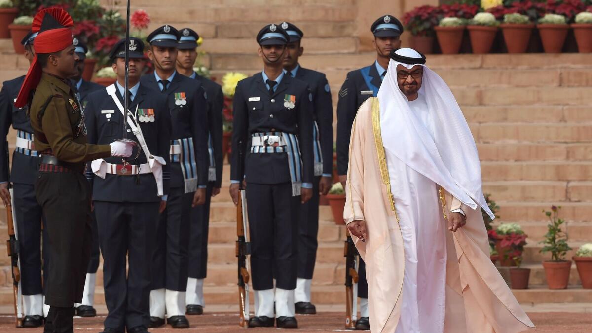 His Highness Shaikh Mohammed bin Zayed Al Nahyan, Crown Prince of Abu Dhabi and Deputy Supreme Commander of the UAE Armed Forces, returns after inspecting a guard of honor upon his arrival at the Indian presidential palace, in New Delhi, India, Thursday, Feb. 11 2016.