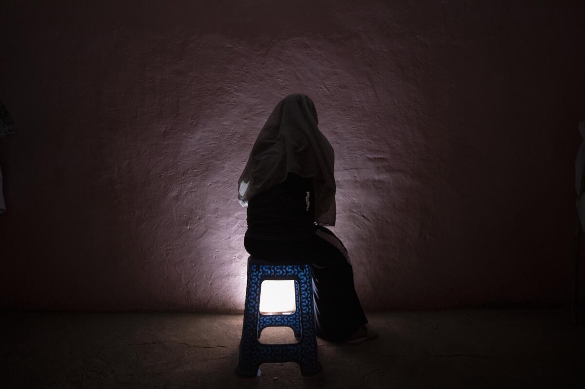 A Tigrayan refugee rape victim who fled the conflict in Ethiopia's Tigray sits for a portrait in eastern Sudan near the Sudan-Ethiopia border, on March 20, 2021. — AP file