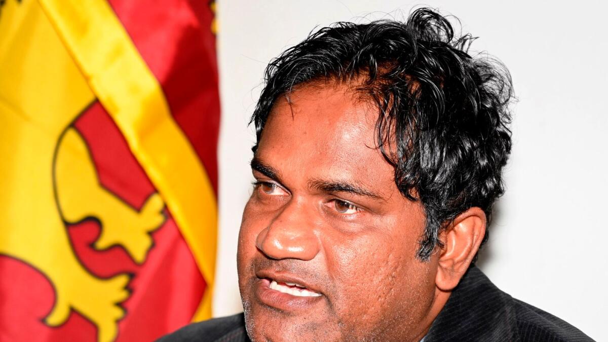 Former Sri Lankan cricket bowling coach and fast bowler Nuwan Zoysa speaks during a press conference in Colombo on Friday. — AFP