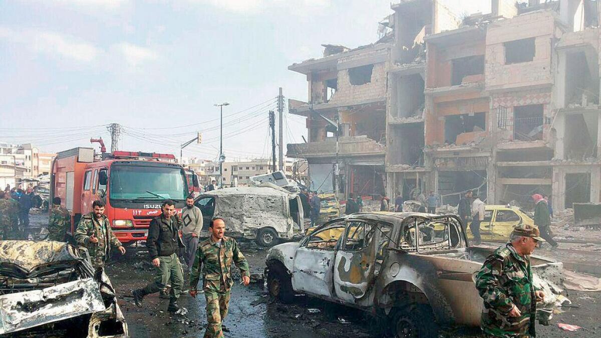 At least 30 killed in four bomb blasts in southern Damascus district