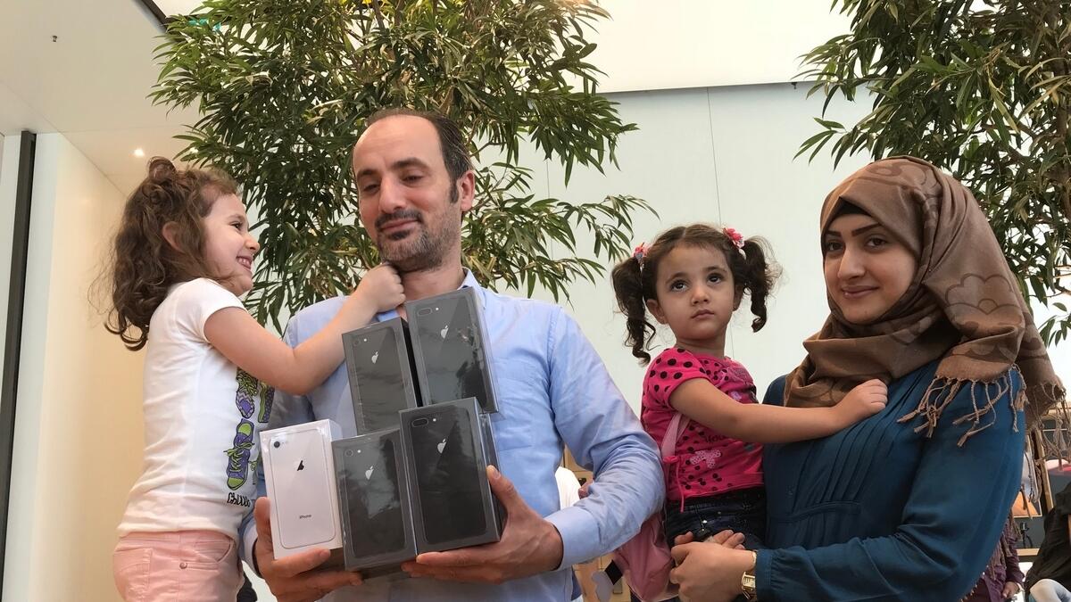 Ibrahim Alchamsi gets the new iPhone8 at The Dubai Mall Apple Store.