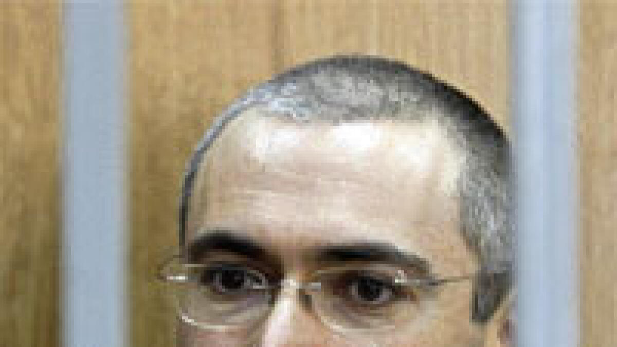 Vladimir Putin to pardon jailed tycoon Khodorkovsky
