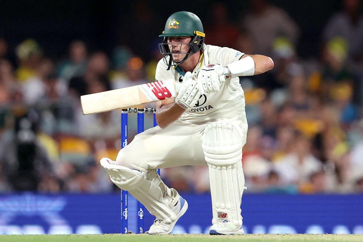 Australia's Pat Cummins bats during day two of the second cricket Test match between Australia and West Indies at the Gabba in Brisbane. - AFP