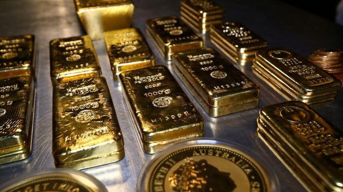Gold's record-high stands at $1,921.18 an ounce.