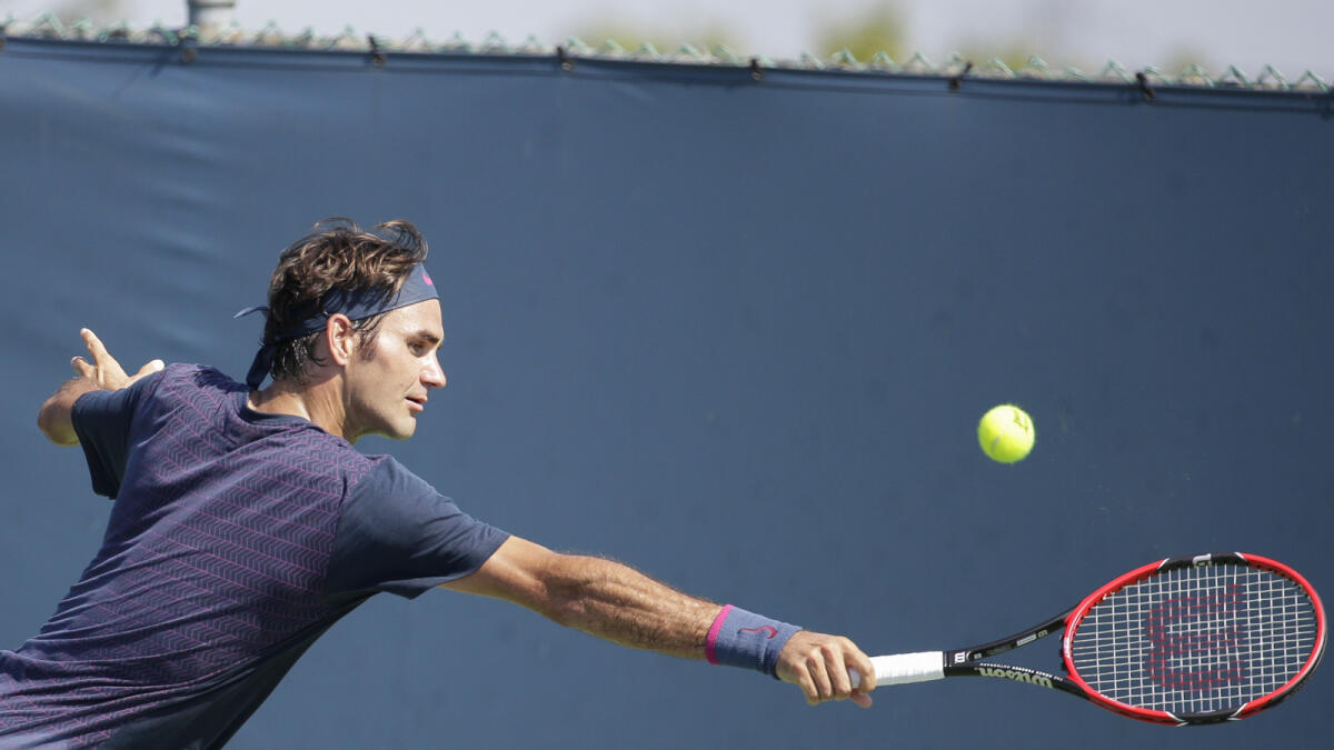 Roger Federer practises on Sunday. 