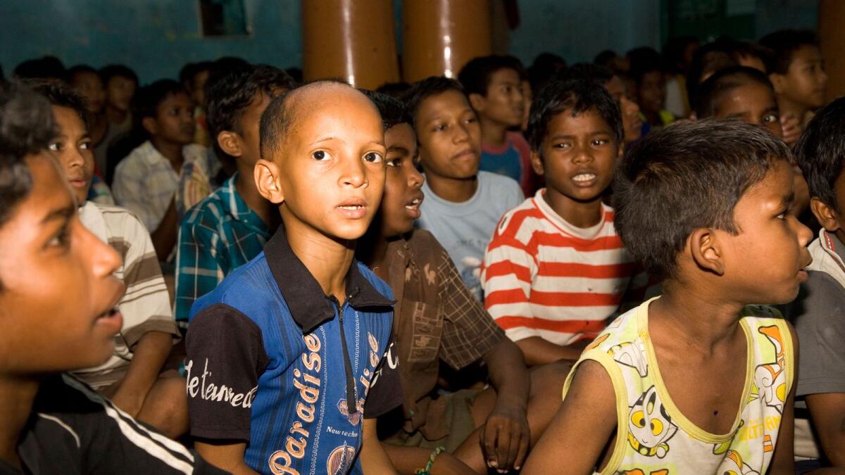 Orphaned children at an orphanage in India. Photo: Alamy
