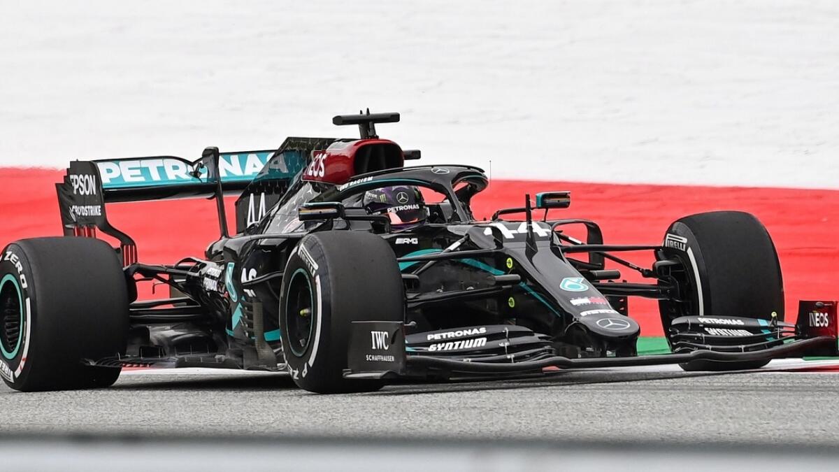 Mercedes' British driver Lewis Hamilton steers his car during the first practice session at the Austrian Formula One Grand Prix  in Spielberg