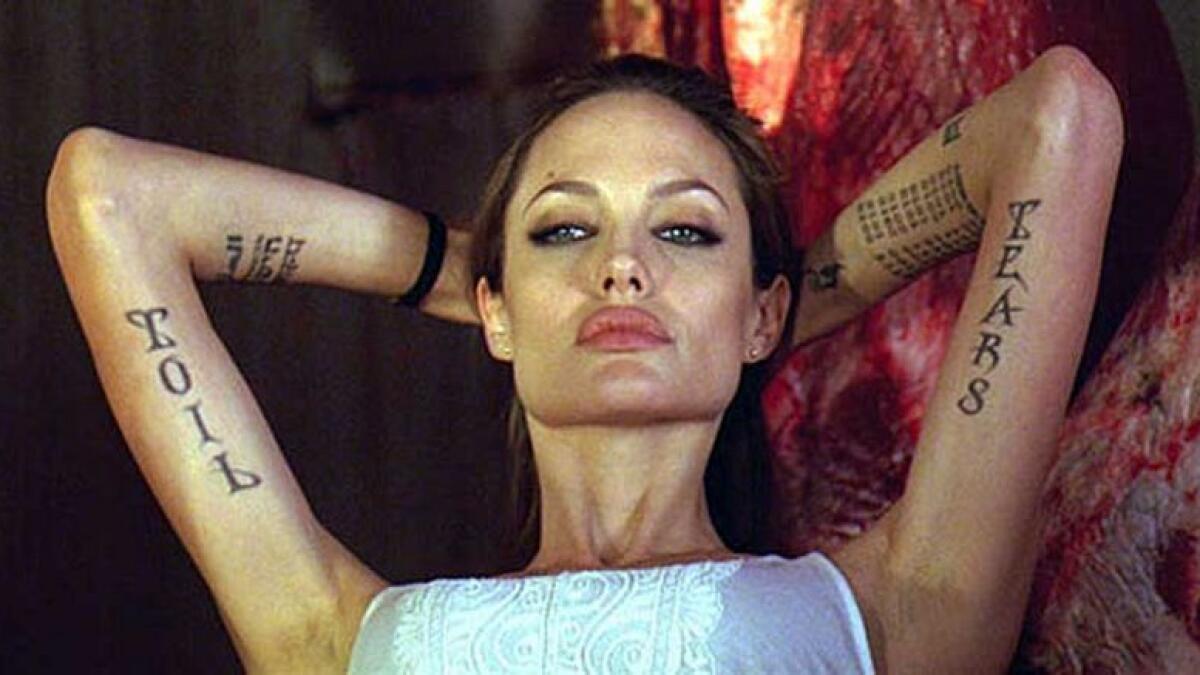 Actress Angelina Jolie had been spotted with three large new tattoos while she was working for her film “First They Killed My Father”. – Alamy Image