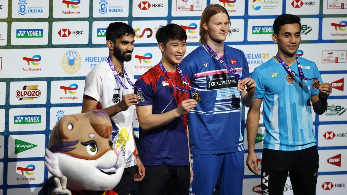 (From left) Silver medallist Srikanth Kidambi of India, gold medallist Loh Kean of Singapore, bronze medallists Anders Antonsen of Denmark and Lakshya Sen of India pose on the podium. (AFP)