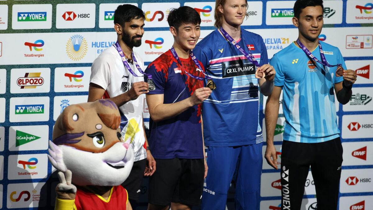 (From left) Silver medallist Srikanth Kidambi of India, gold medallist Loh Kean of Singapore, bronze medallists Anders Antonsen of Denmark and Lakshya Sen of India pose on the podium. (AFP)