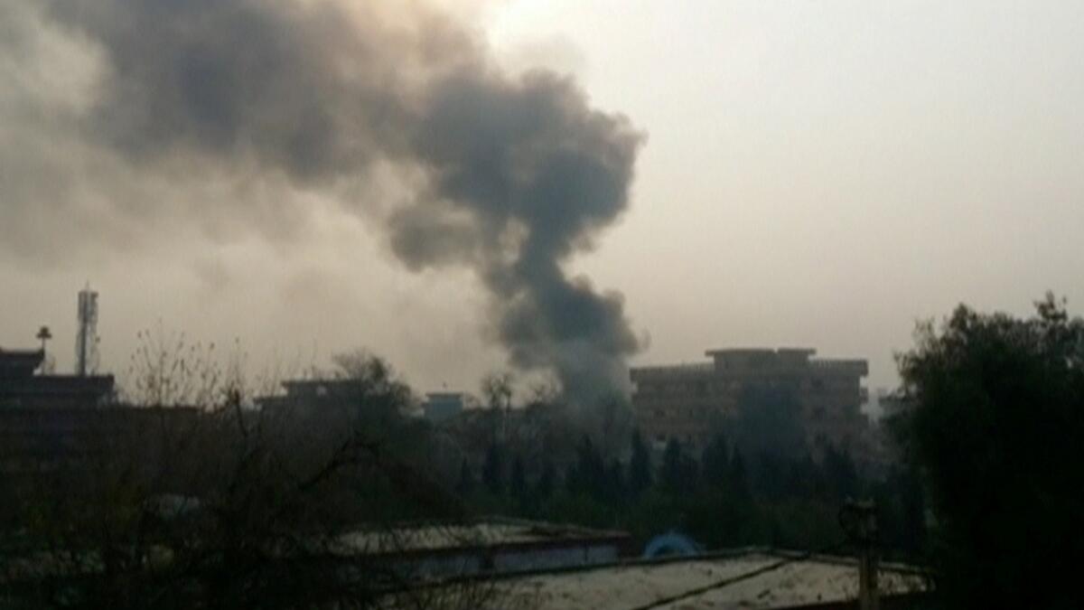 Smoke rises at the site of a blast near the office of the Save the Children aid agency in Jalalabad, Afghanistan, in this still image taken from Reuters TV footage.-Reuters