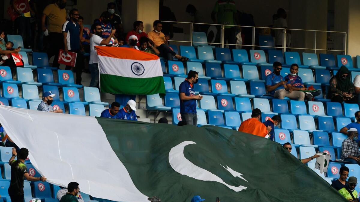 Fans filling up the stands at the Dubai International Cricket Stadium. (Photo: AFP)