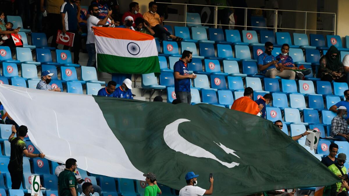 Fans filling up the stands at the Dubai International Cricket Stadium. (Photo: AFP)