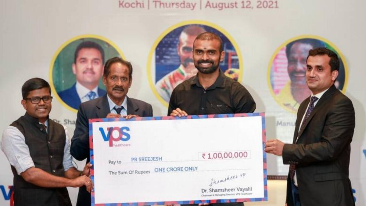 PR Sreejesh was presented with the cheque by Manuel Frederick during an event organised by UAE-based VPS Healthcare group. (Supplied photo)