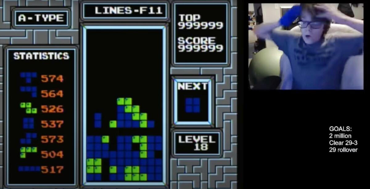 In this image taken from video, 13-year-old player named Willis Gibson reacts after playing a game of Tetris. Gibson, who in late December became the first player to officially “beat” the original Nintendo version of the game. By breaking it, of course. — AP
