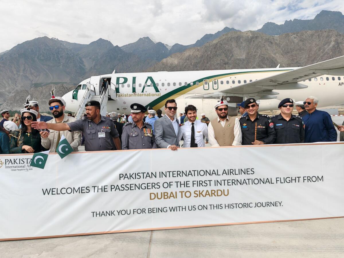 PIA and Skardu government official receive the first international flight to Skardu International Airport from Dubai on Monday.