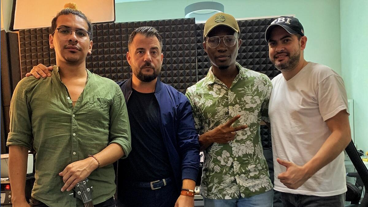 John Rashid with guitarist Alex Munoz, keyboardist Powella Keys and Oscar Martinez who played the bass, did the mastering and produced the video of the single, I Can't Breathe