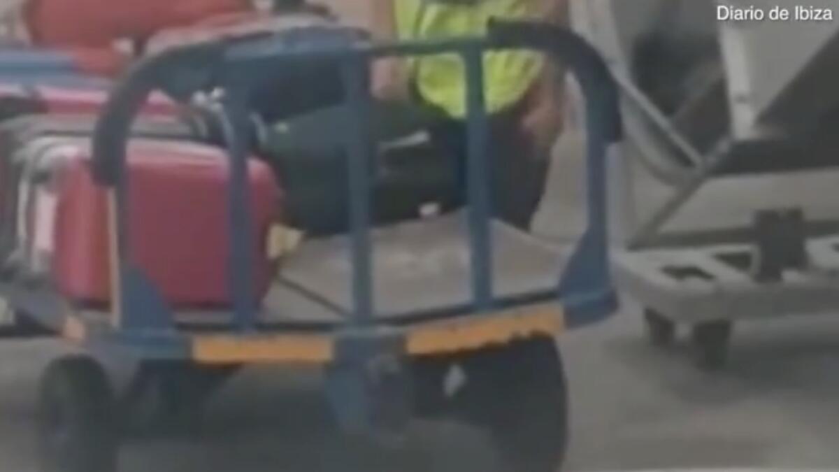 Video: Baggage handler steals from passengers luggage  