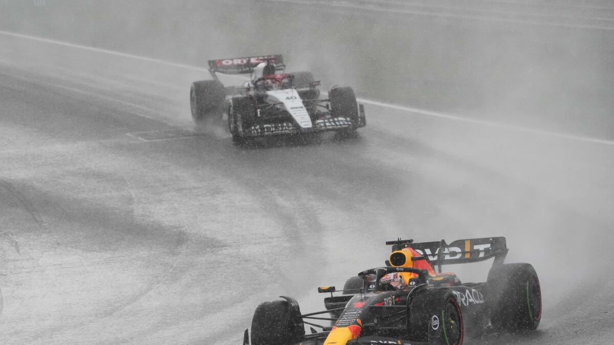 Red Bull driver Max Verstappen leads AlphaTauri driver Liam Lawson of New Zealand during the Formula One Dutch Grand Prix. — AP