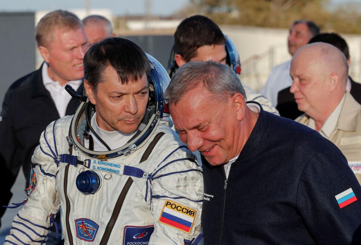 Chief of Russian space agency Roscosmos Yuri Borisov accompanies cosmonaut Oleg Kononenko, who boards the Soyuz MS-24 spacecraft at the Baikonur cosmodrome, Kazakhstan, on September 15, 2023. — Reutes file