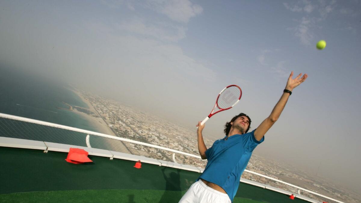 Roger Federer during the friendly 'hit' on the Helipad of the Burj Al Arab. — AFP file