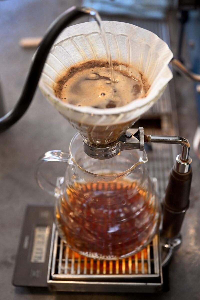 Coffee being filtered at the Proud Mary cafe in Melbourne. — AFP file