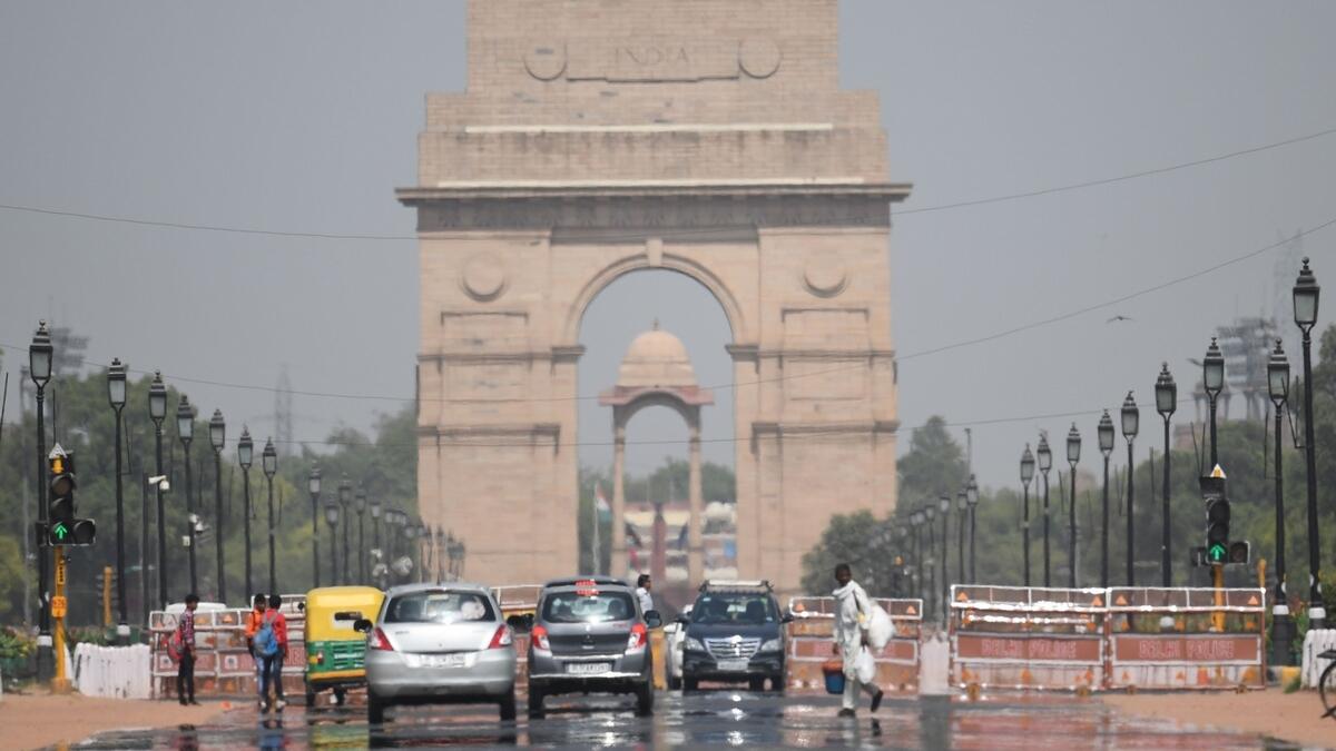 A mirage shimmers over Rajpath leading to India Gate as temparatures rise in New Delhi on June 10, 2019.-AFP