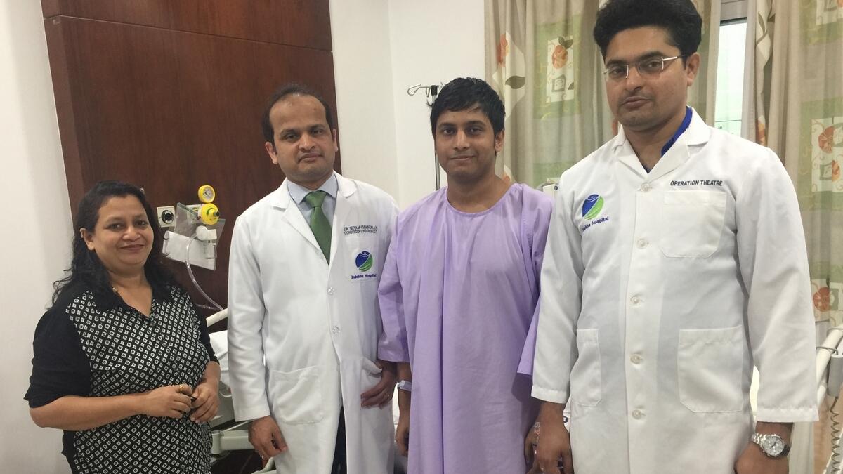 Pranva Prasad with his mother, Dr Shyam Babu Chandran and Dr Amriten.-Supplied photo