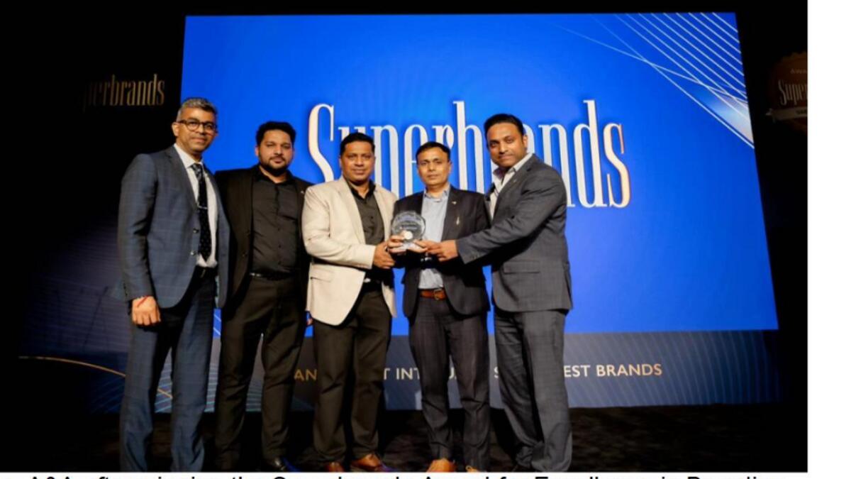 Team A&amp;A after winning the Superbrands award for excellence in branding
