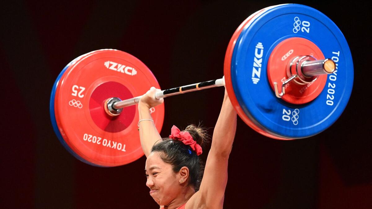 Mirabai Chanu competes in the women's 49kg weightlifting competition. (AFP)