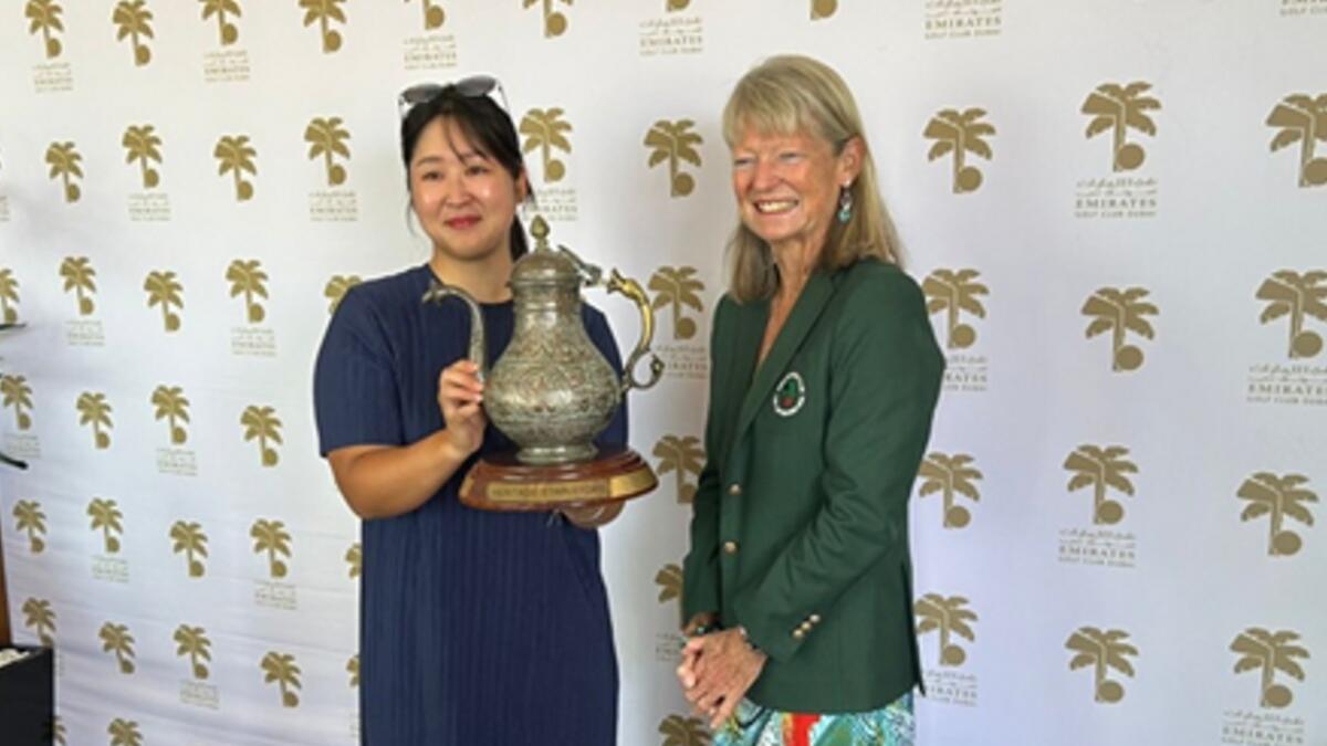 Minkyeong Kim (left) being presented by the Ladies' Heritage Trophy by EGC Lady Captain Fiona Berry. - Supplied photo