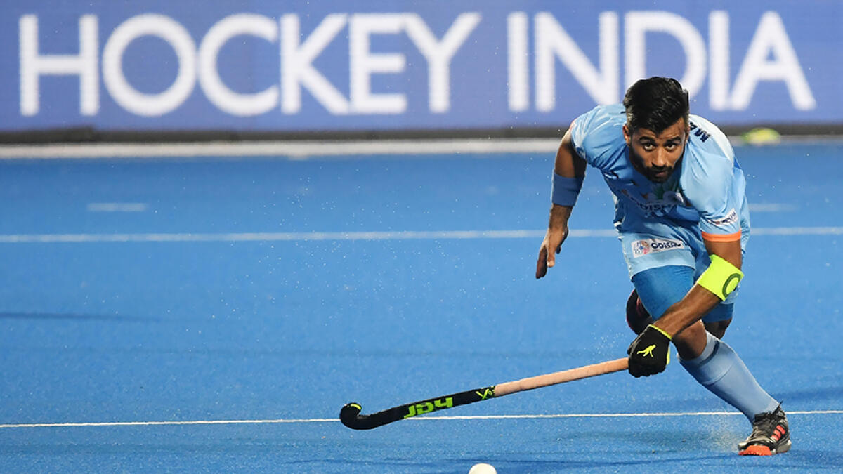 Manpreet Singh, captain of the Indian hockey team, is one among the five players to test positive. -- AFP file