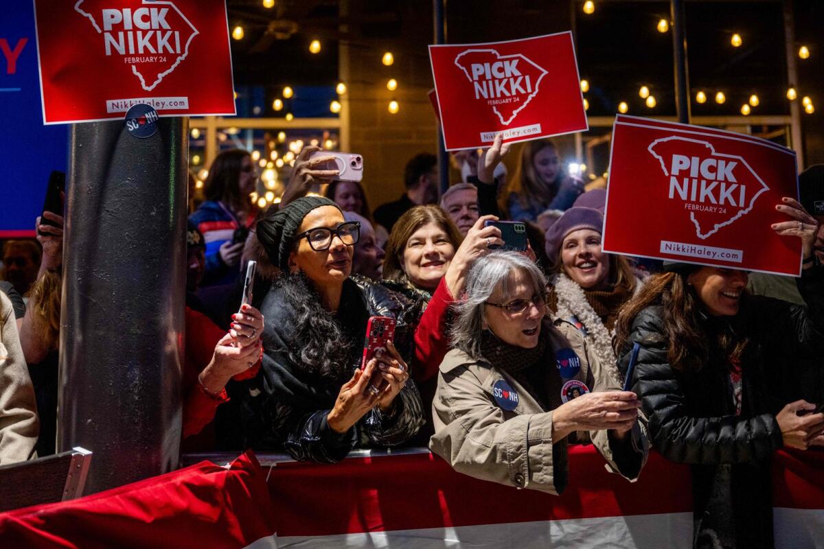 Attendees cheer ahead of the arrival of Republican presidential candidate, former UN ambassador Nikki Haley at a campaign rally at the New Realm Brewing Co. on February 04, 2024 in Charleston, South Carolina. — AFP