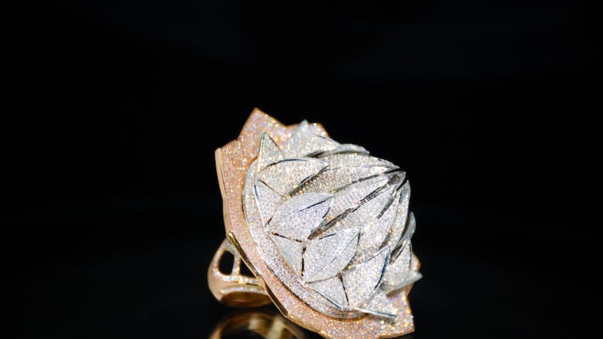The record-breaking ring, weighing 70.42gm, was designed to mimic the shape of a closed lotus flower.