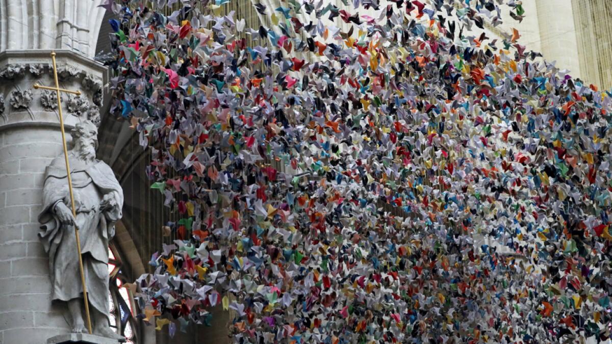 An art installation made of 20,325 origamis called 'Origami For Life' by Belgian designer and artist Charles Kaisin is pictured at the Cathedral of St. Michael and St. Gudula, which aims to raise donations for a Belgian hospital in its fight against the coronavirus disease pandemic, in Brussels, Belgium. Photo: Reuters