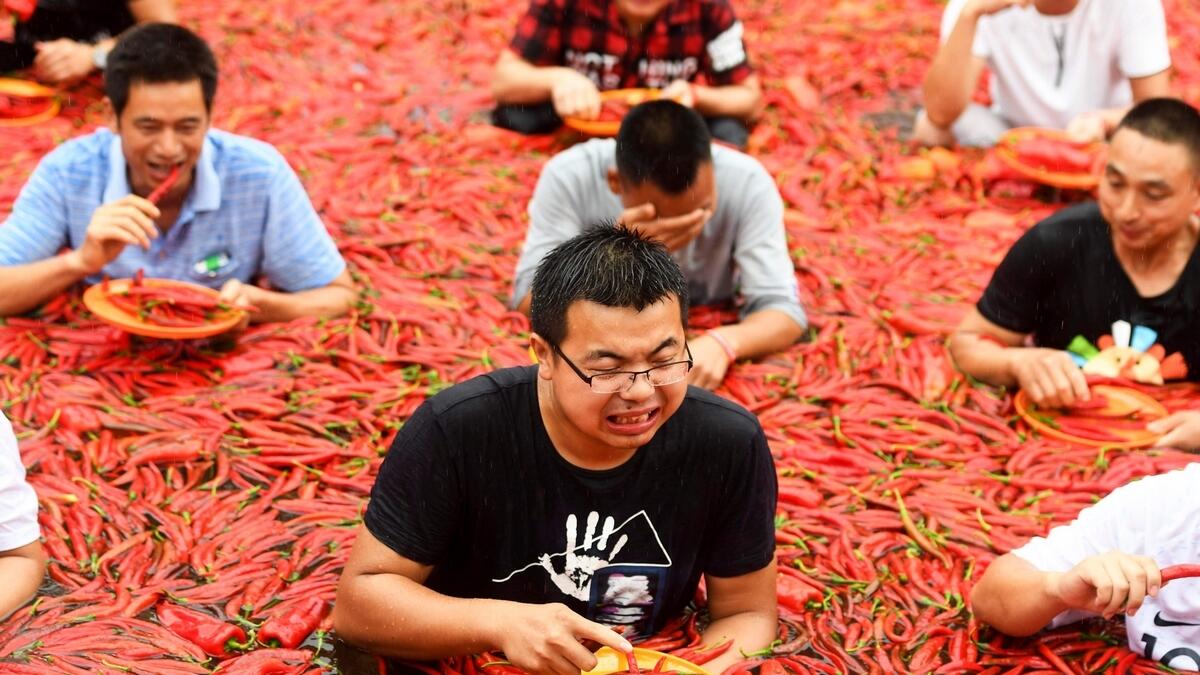 Video: Man eats 50 chillies in one minute to win competition