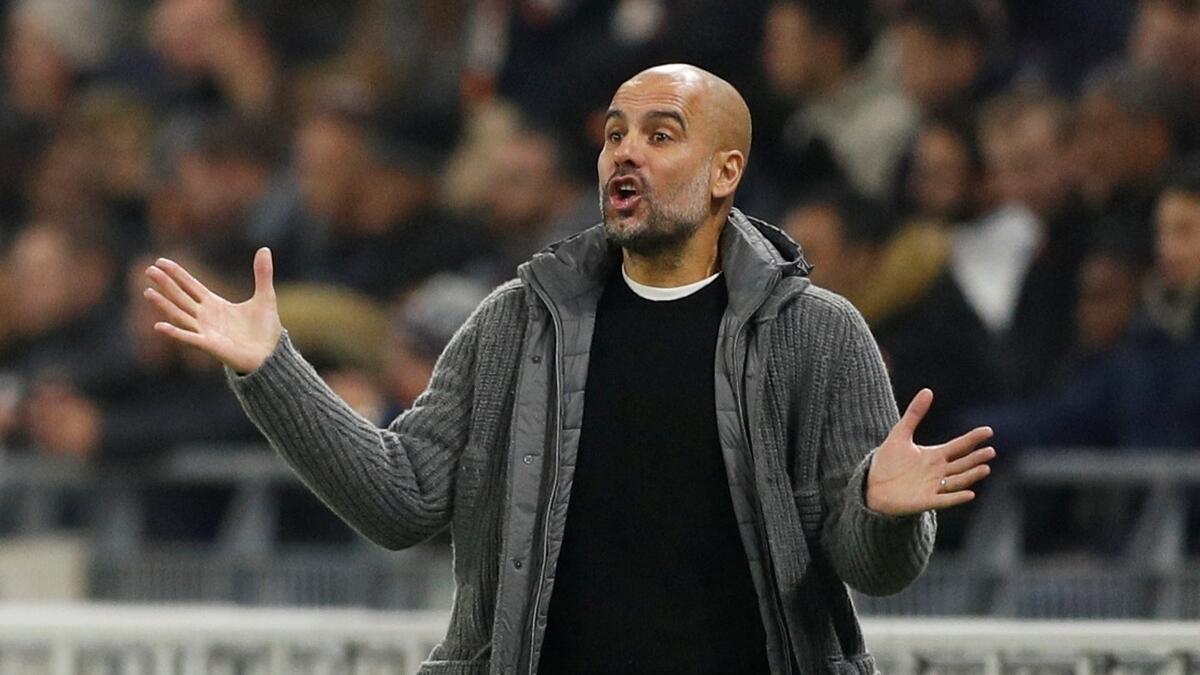 Defiant Guardiola insists on business as usual