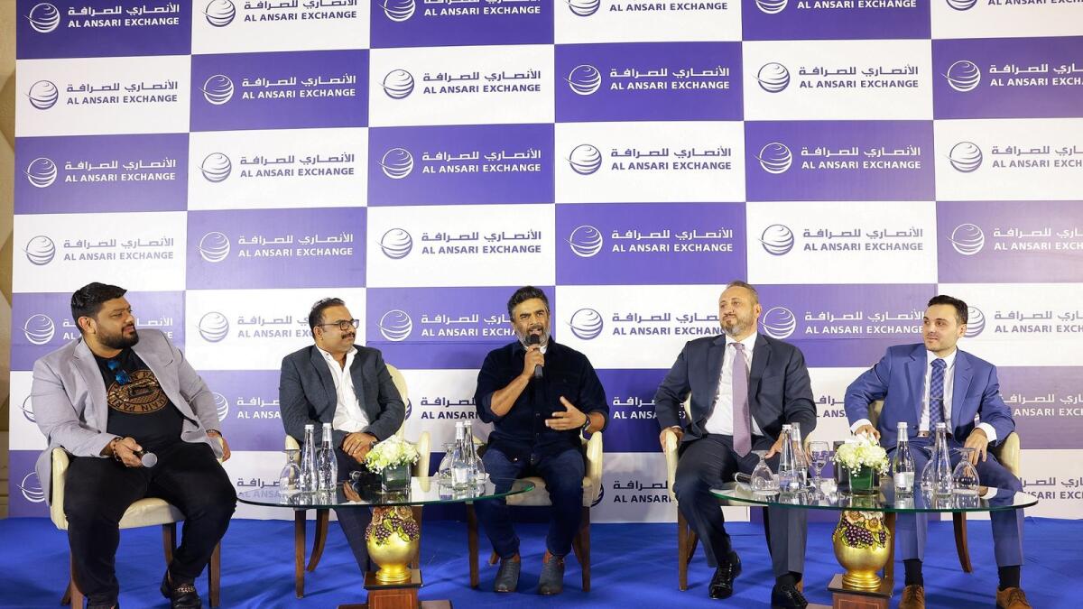 R. Madhavan and senior executives of Al Ansari Exchange at the media briefing in Dubai on Tuesday. — Supplied photo