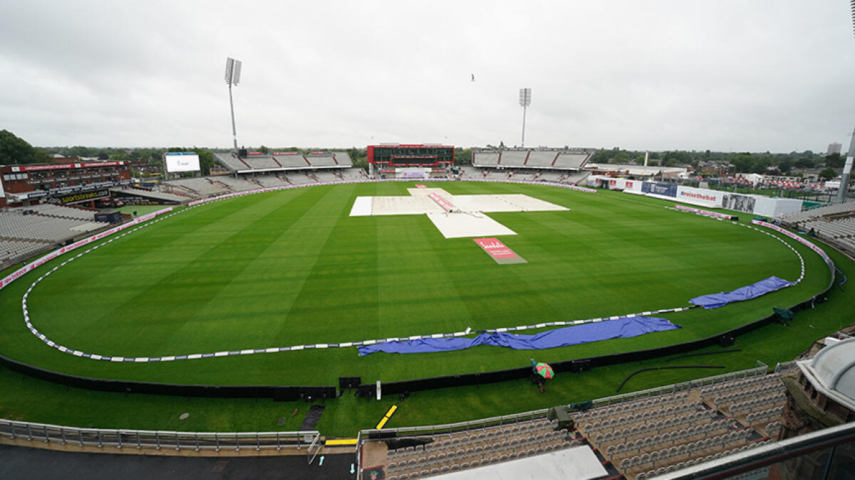 Covers are on as rain delays start of play on the third day of the second Test cricket match between England and the West Indies at Old Trafford in Manchester on Saturday. -- AFP