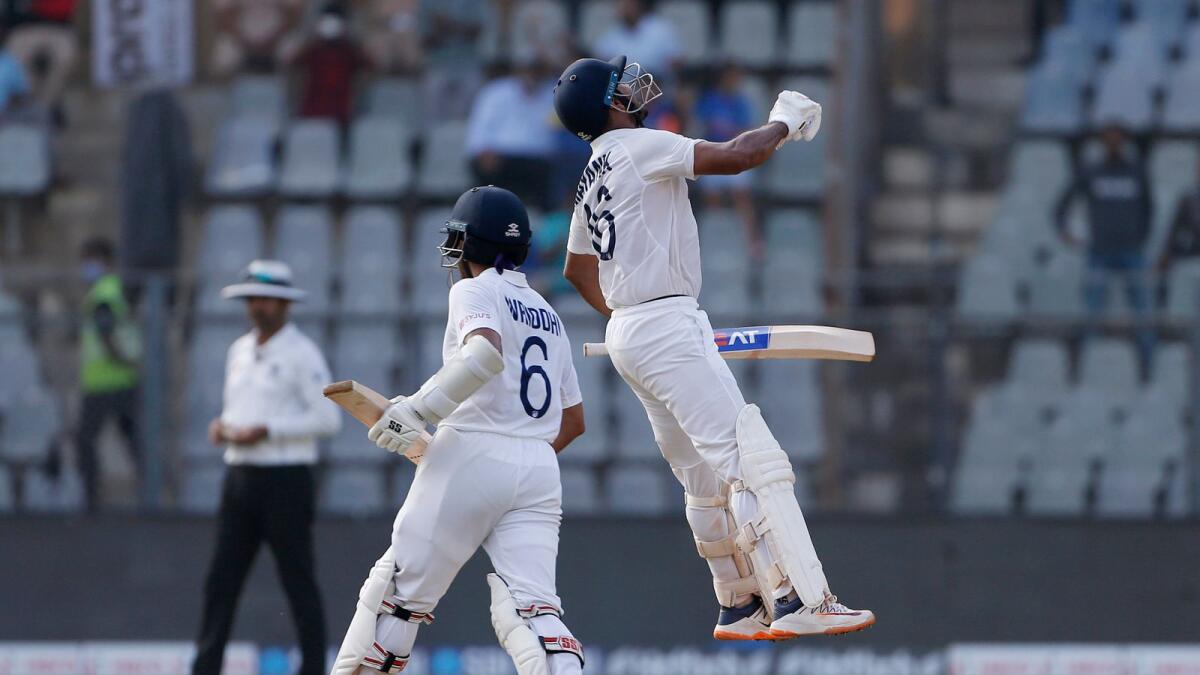 India's Mayank Agarwal celebrates his century on the first day of the second Test against New Zealand at the Wankhede Stadium in Mumbai on Friday. — ANI