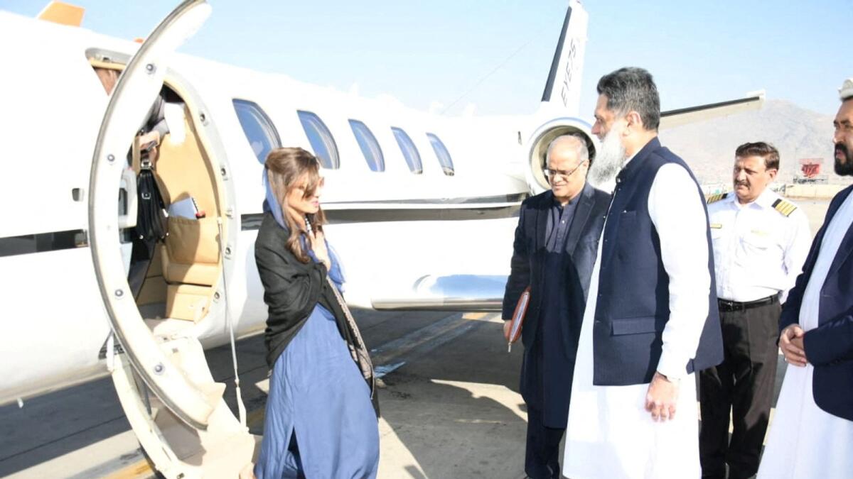 Pakistan's Minister of State Hina Rabbani Khar greets Ubaid-ur-Rahman Nizamani, head of Mission of Embassy of Pakistan, upon her arrival in Kabul in November. - Reuters file