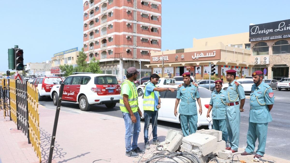 Woman injured after high-speed collision with RAK traffic light