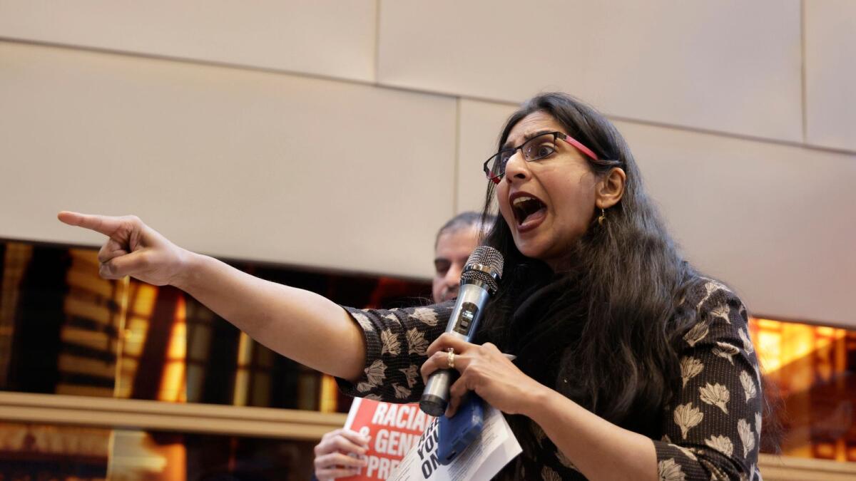 Seattle Council Member Kshama Sawant speaks to supporters and opponents of a proposed ordinance to add caste to Seattle’s anti-discrimination laws at a rally at Seattle City Hall. — AP