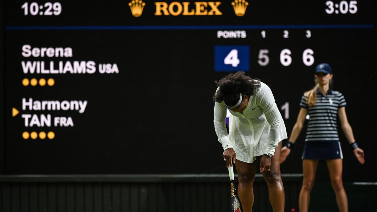 US player Serena Williams reacts as she plays against France's Harmony Tan during their women's singles tennis match on the second day of the 2022 Wimbledon Championships. Photo: AFP