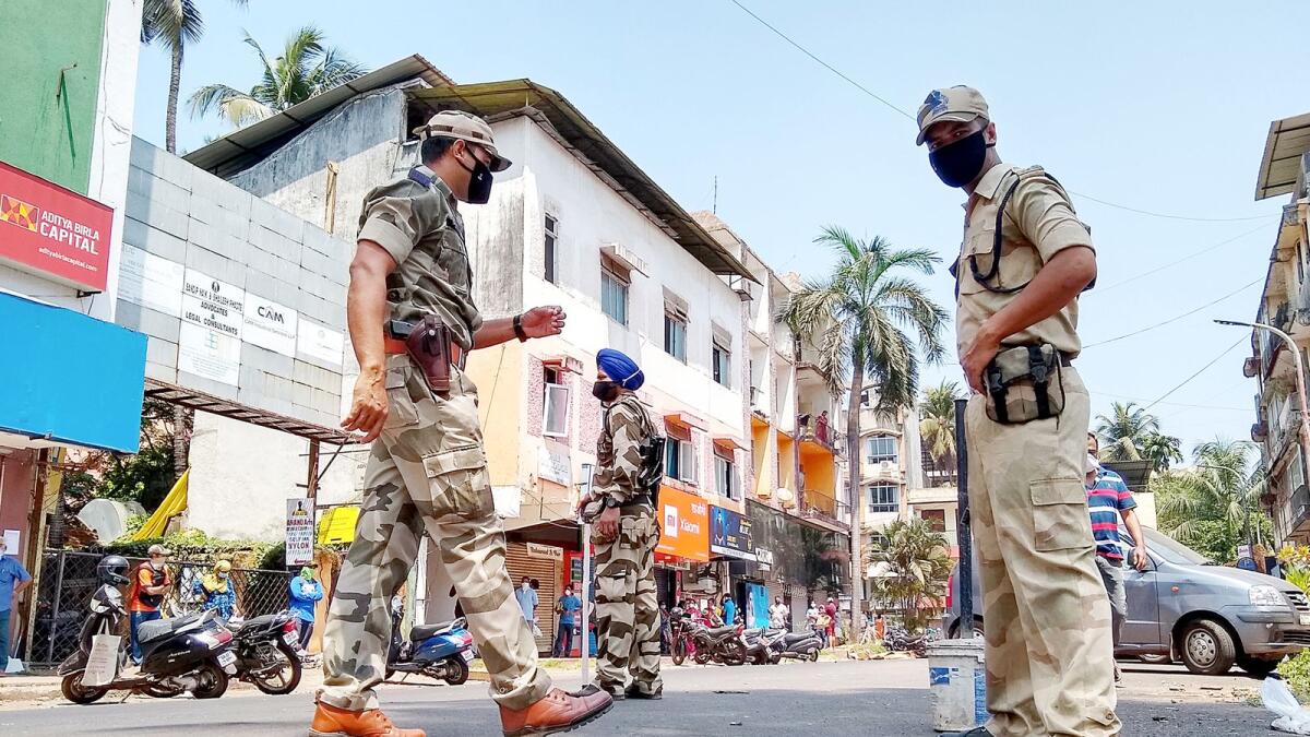 Paramilitary soldiers patrol along a street during a government-imposed  lockdown as a preventive measure against coronavirus in Goa. Photo: AFP