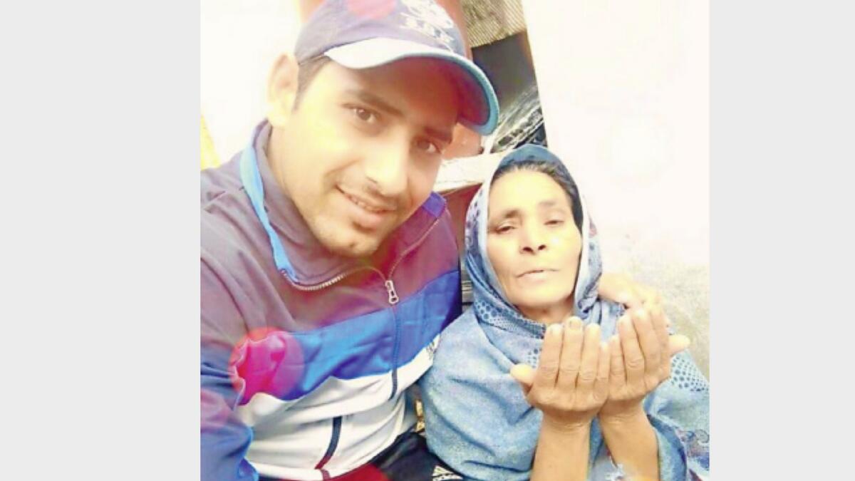 UAE pace bowler Zahoor Khan with his late mother Farhad Bibi. (Supplied photo)