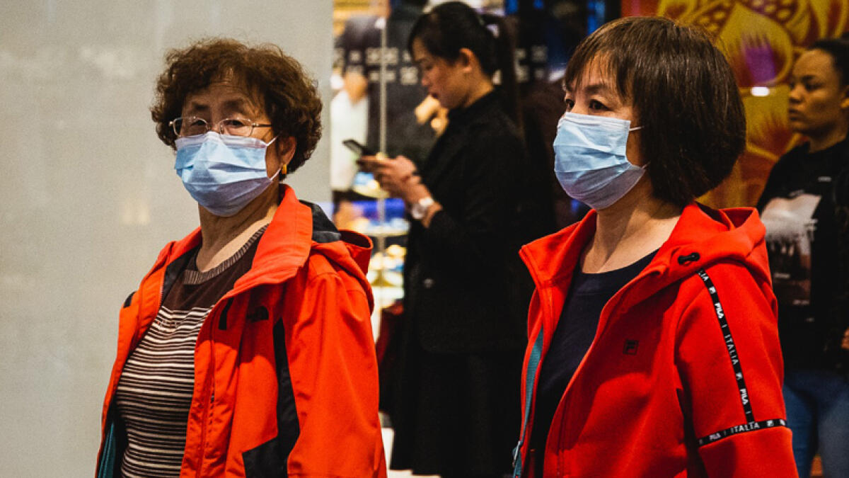 in light of the Wuhan coronavirus, Chinese expats wore face masks as a preventive measure.