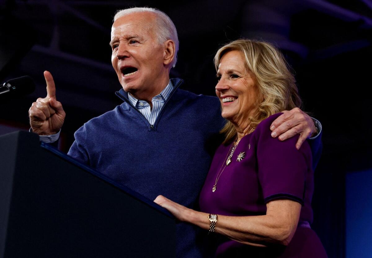 US President Joe Biden gestures while he speaks as first lady Jill Biden stands next to him during a campaign event at Strath Haven Middle School in Wallingford, Pennsylvania, US, on March 8, 2024. — Reuters file