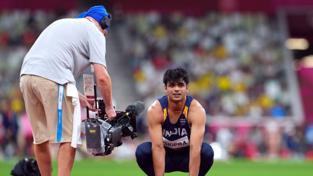 Neeraj Chopra of India is recorded after winning gold. — Reuters