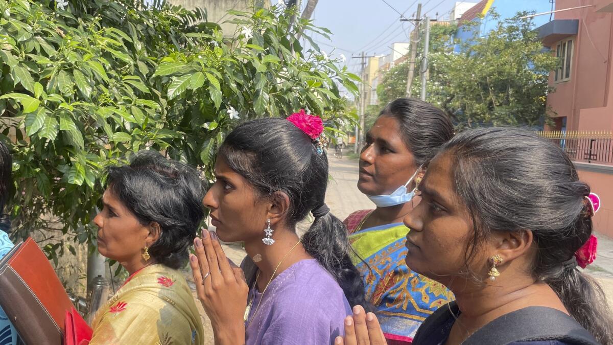 Visa seekers gather to pray at the Sri Lakshmi Visa Ganapathy Temple in Chennai, a city on the southern coast of India, on November 28, 2022. — AP